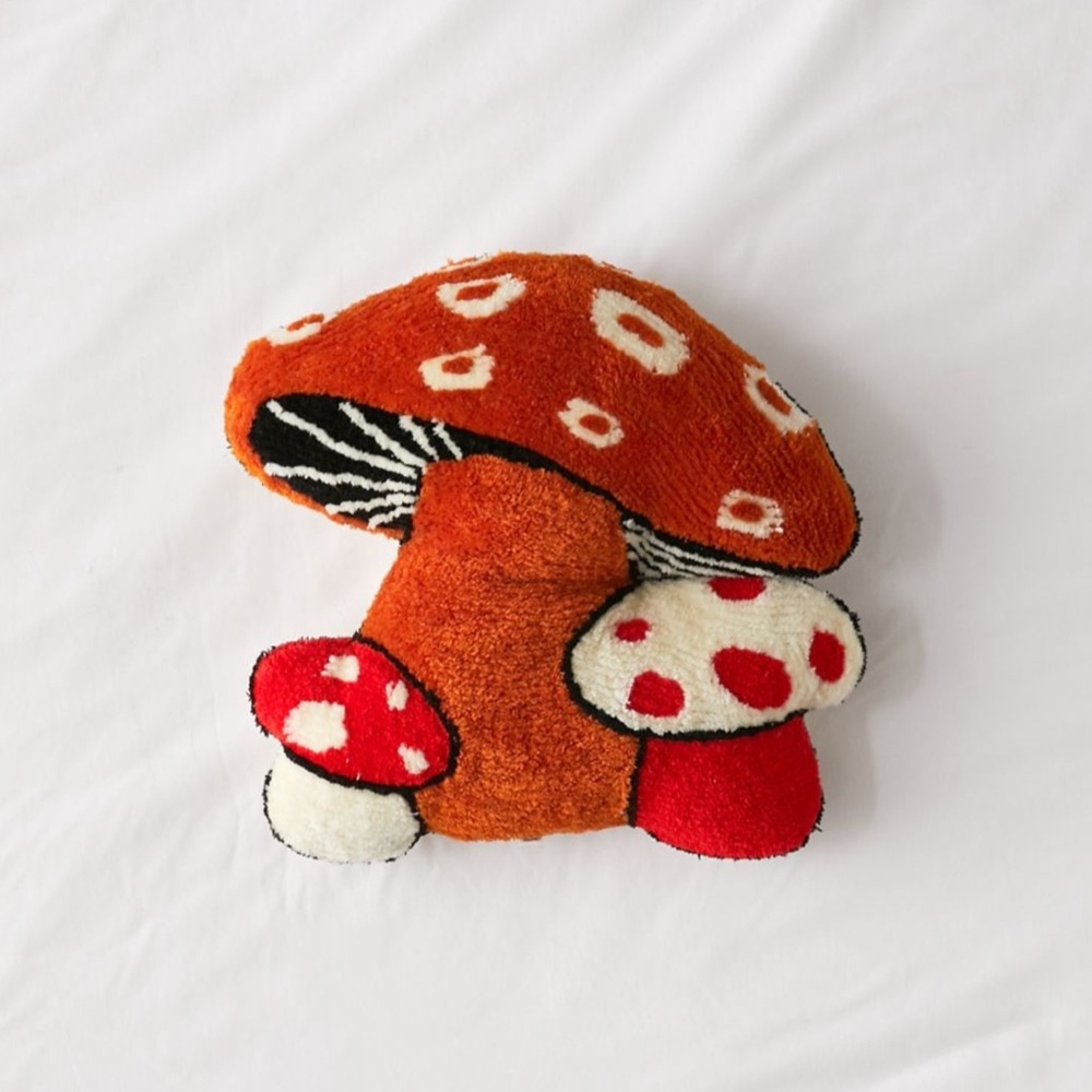 UO mushroom tufted throw pillow